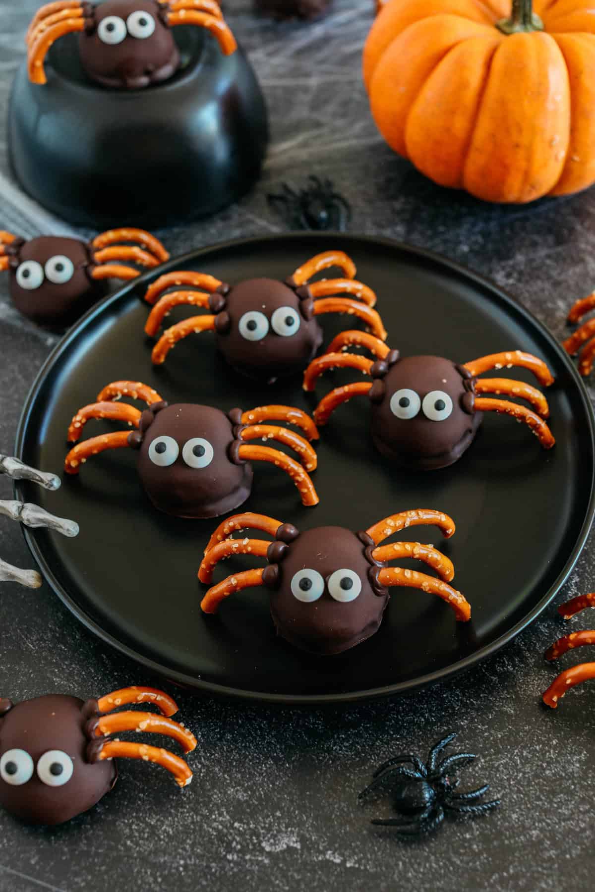 Get festive this Halloween with these tasty Chocolate Peanut Butter Spider Balls made with just 5 simple ingredients and zero baking required! The perfect sweet and salty treats that are easy to make and your kids will love!