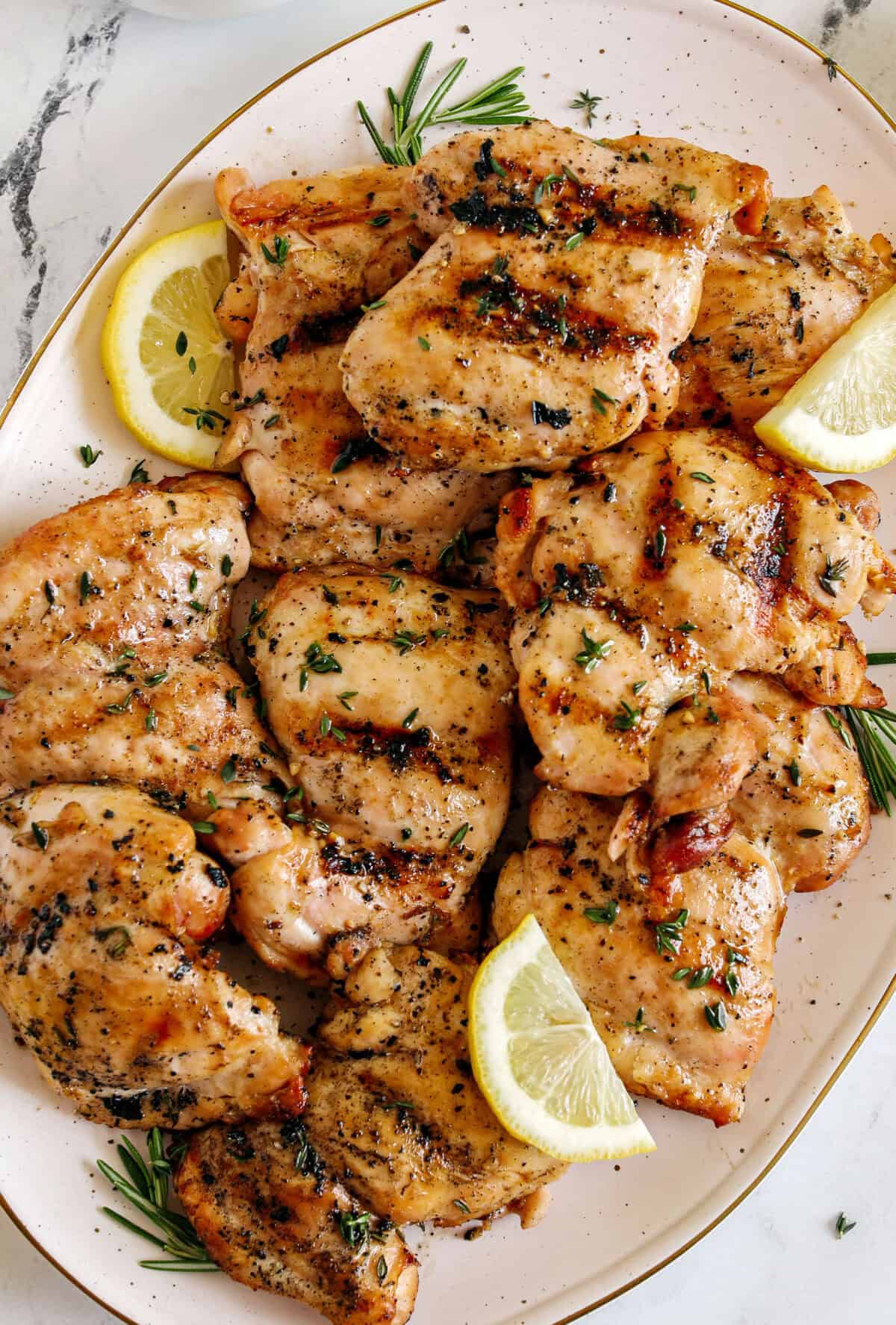 This Lemon Herb Grilled Chicken is easily made with just a few simple ingredients for a delicious, healthy meal! Packed with so much flavor thanks to tangy lemon juice, tons of garlic, and fresh thyme!