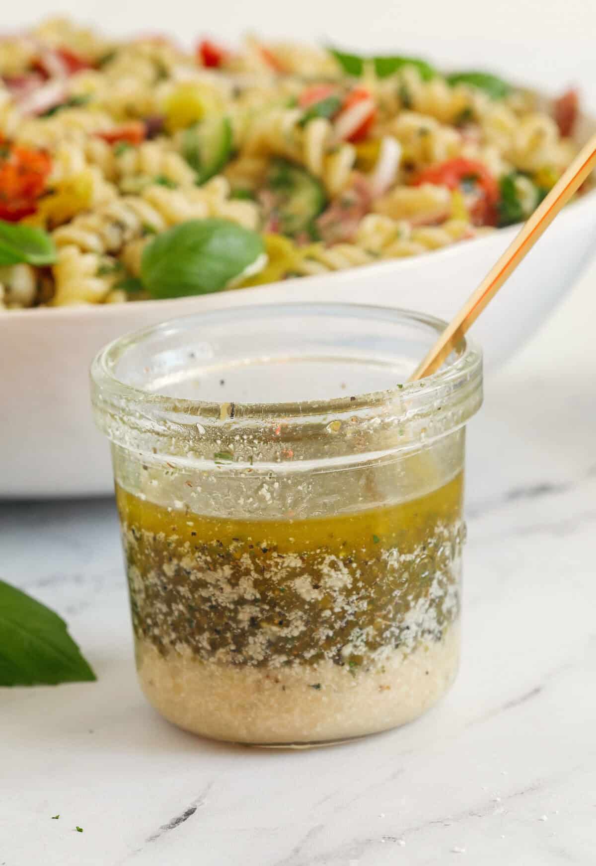 You'll love this zesty homemade Easy Italian Dressing made in just minutes with a few simple pantry ingredients! Perfect for salads, veggies, marinades, and more!