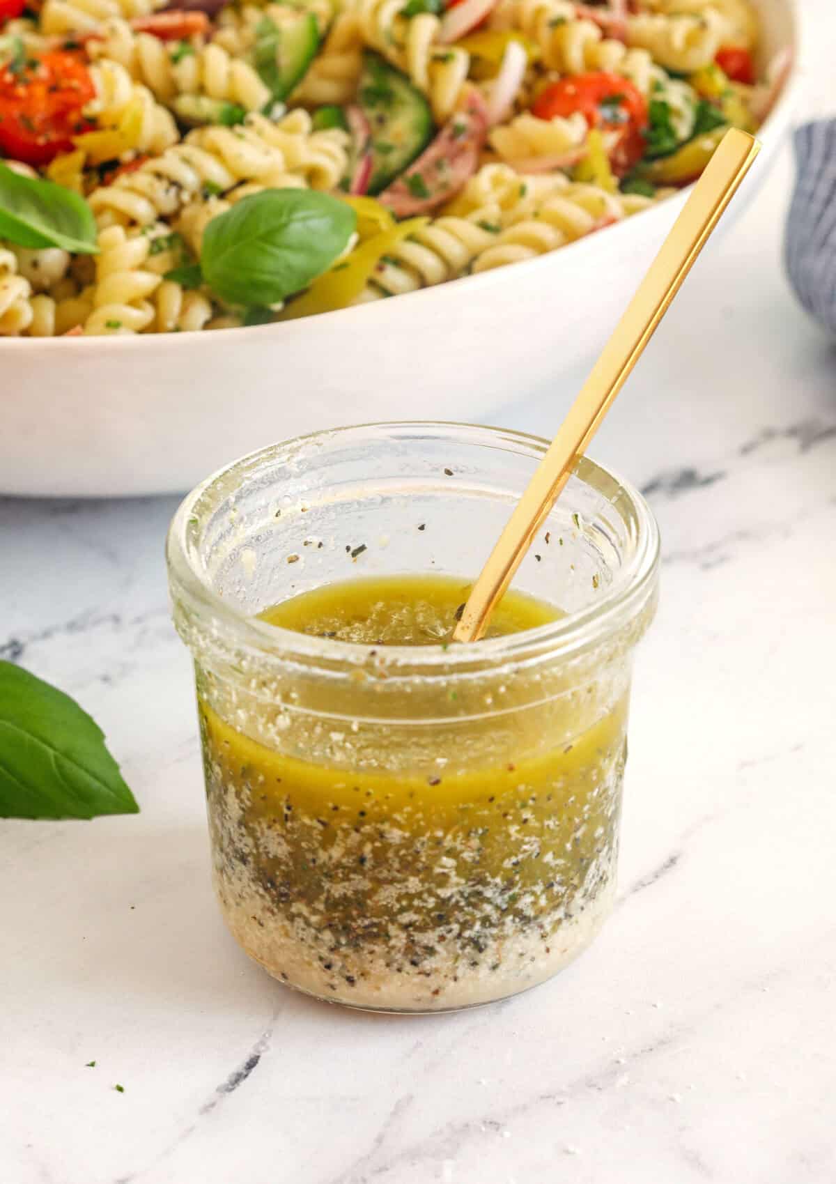 You'll love this zesty homemade Easy Italian Dressing made in just minutes with a few simple pantry ingredients! Perfect for salads, veggies, marinades, and more!