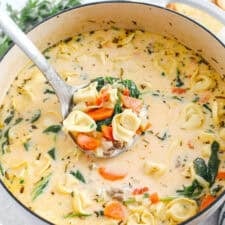 This Creamy Sausage and Spinach Tortellini Soup is delicious, loaded with veggies and makes the perfect cozy meal that can easily be made in your instant pot, slow cooker or right on the stove!