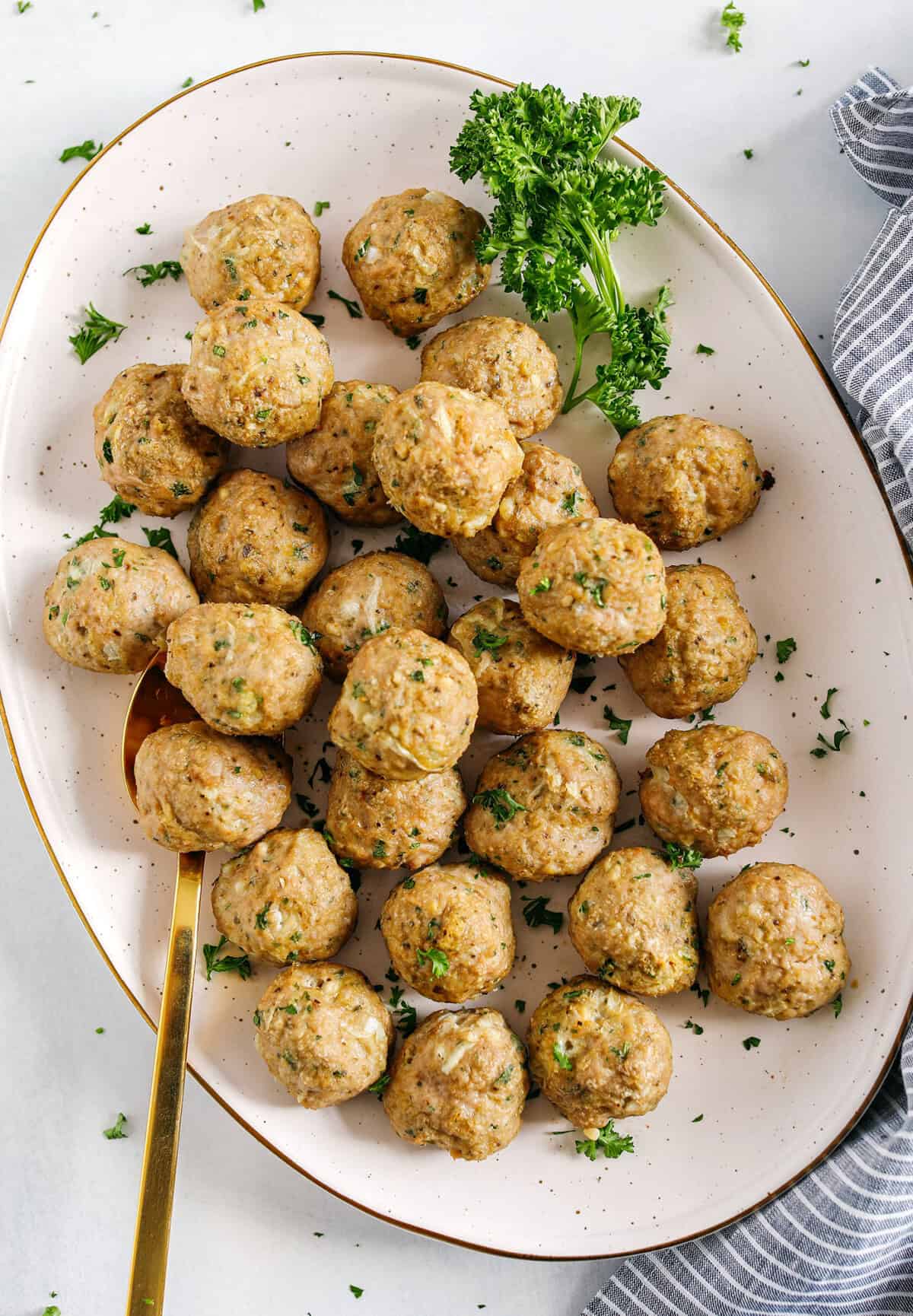 These Easy Turkey Meatballs are tender, juicy and packed with flavor! Made with just a few simple ingredients in under 30 minutes, these baked homemade meatballs can be added to any favorite dish!