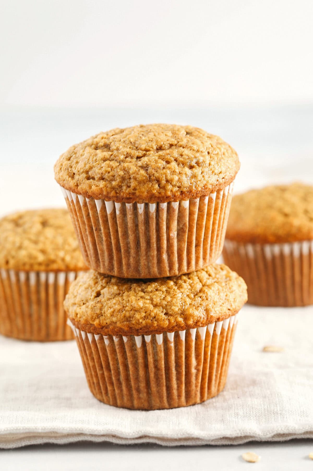 These Healthy Banana Bran Muffins are moist, fluffy, and made healthier with wholesome oat bran cereal, bananas and zero butter or added sugar. Delicious quick on-the-go morning breakfast!