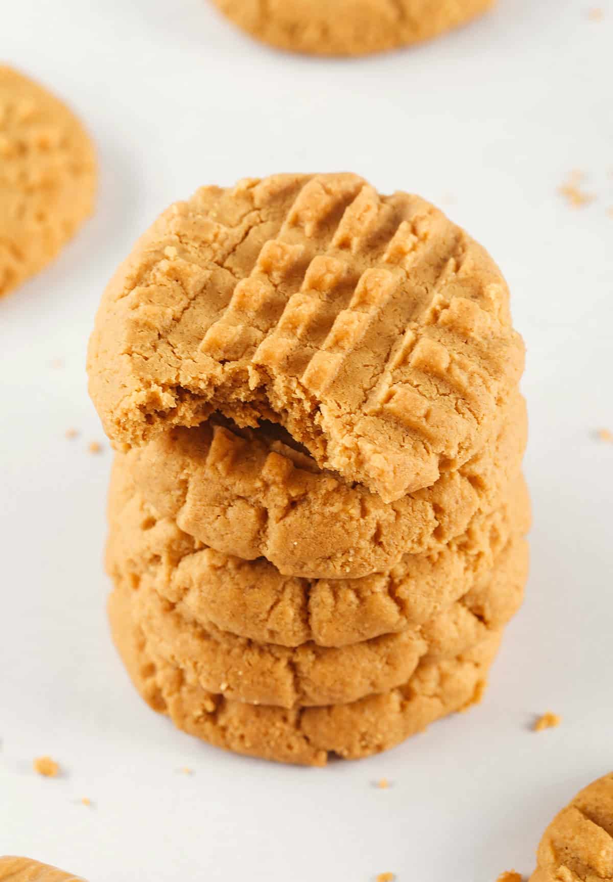 The BEST 5-Ingredient Peanut Butter Cookies recipe made with simple pantry ingredients and zero flour, butter or oil! Soft, chewy cookies with rich peanut butter flavor are the perfect gluten-free sweet treat.