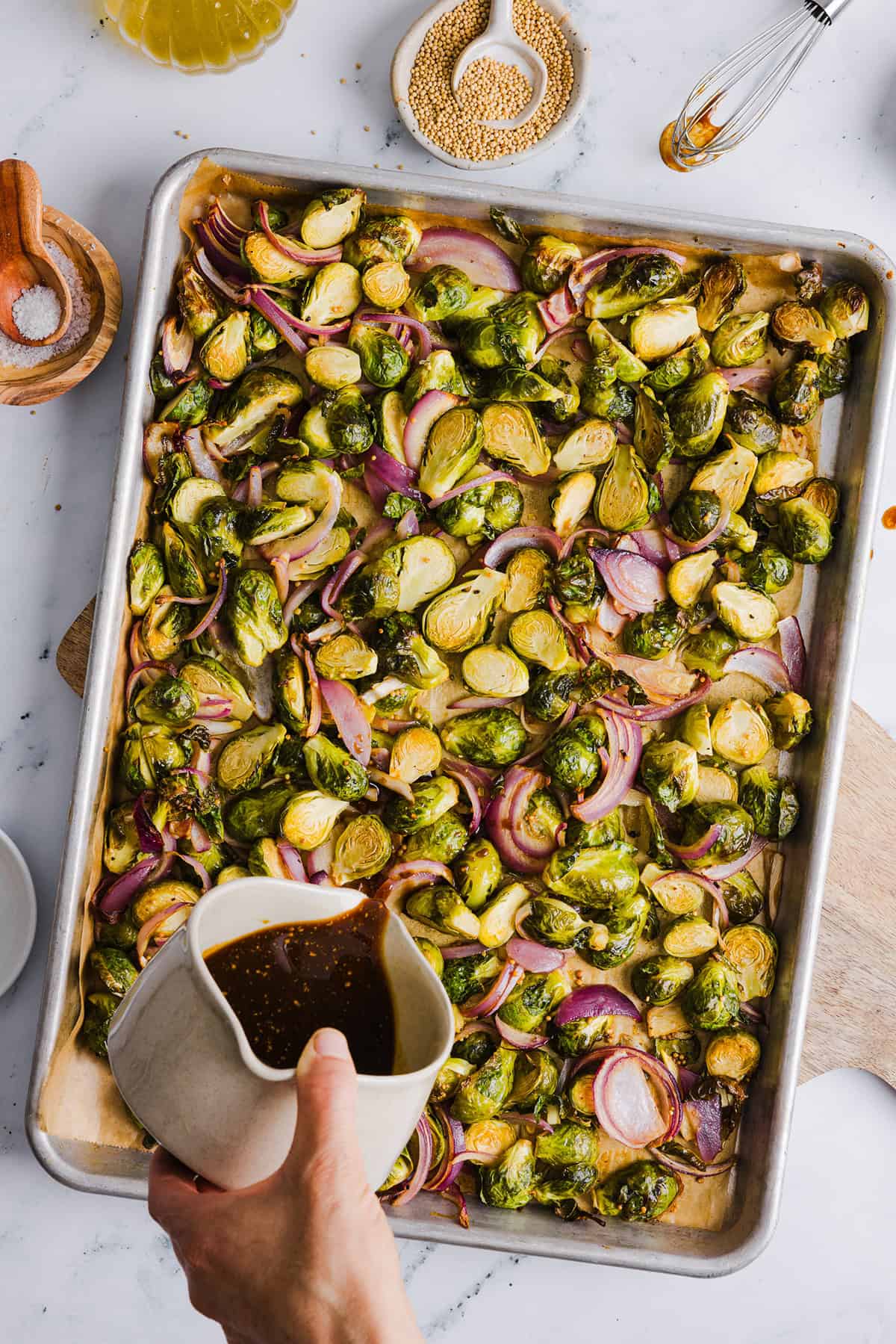 These Balsamic Roasted Brussels Sprouts make the perfect side dish that is so flavorful and easily made in under 30 minutes!  The honey balsamic glaze is simply incredible!