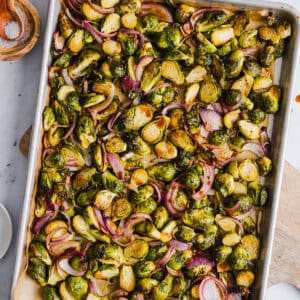 These Balsamic Roasted Brussels Sprouts make the perfect side dish that is so flavorful and easily made in under 30 minutes!  The honey balsamic glaze is simply incredible!