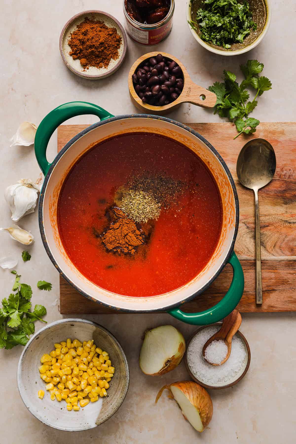 This Healthy Chicken Enchilada recipe is a family favorite made with wholesome, flavorful ingredients for the perfect weeknight meal! The homemade enchilada sauce tastes absolutely amazing! 