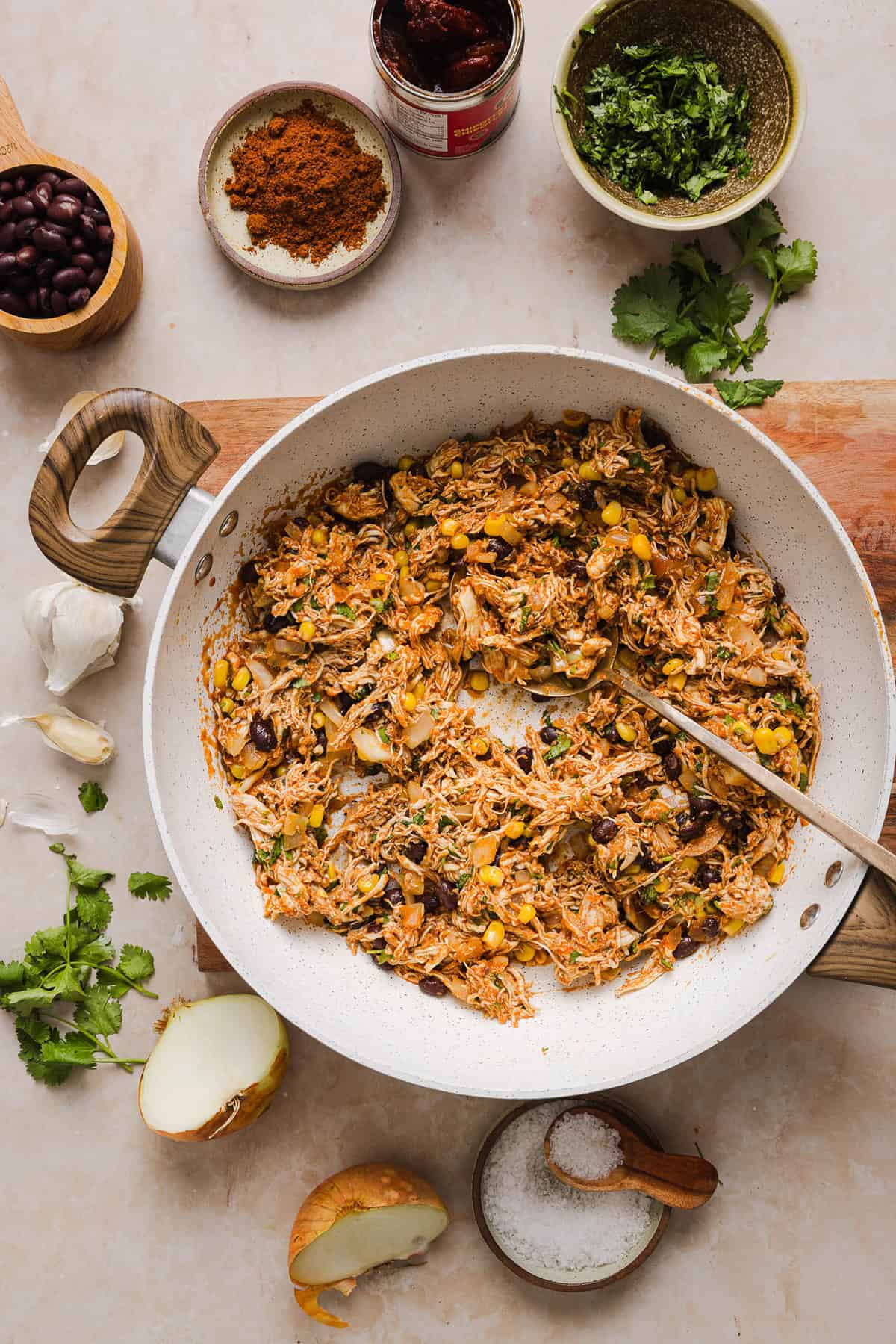 This Healthy Chicken Enchilada recipe is a family favorite made with wholesome, flavorful ingredients for the perfect weeknight meal! The homemade enchilada sauce tastes absolutely amazing! 