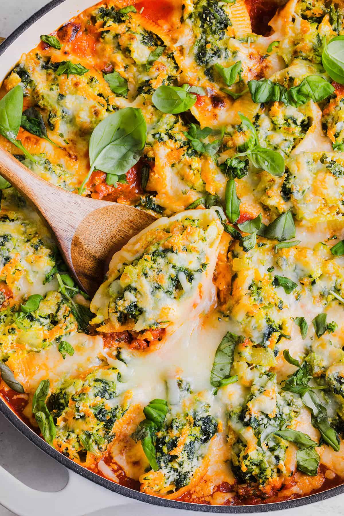 These cozy Veggie and Cheese Stuffed Shells are a family favorite that are loaded with vegetables, easy to freeze and make the perfect weeknight meal! The ultimate comfort food with a healthy twist! 